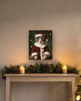 Portrait Le Père Noël sur toile 40 × 50 cm, accrochée au-dessus d’un meuble (photomontage, échelle indicative)